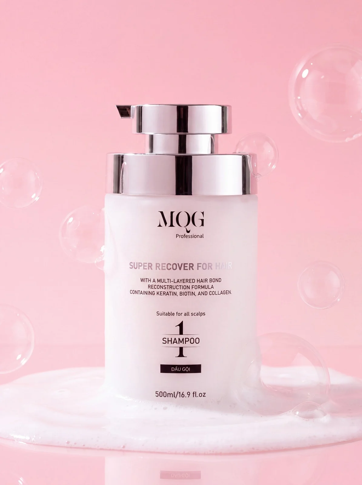 Dầu gội MQG 500 ml trên nền bọt hồng